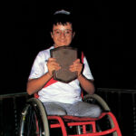 Luis Betts, 14, with his award in 1986. (SNS Photo file).