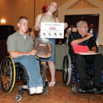 SNS founding editor, Cliff Crase presenting the award to Michael Timpa in Mesa, Ariz. (SNS File photo).