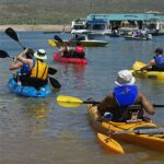 People of all ages gathered at Bartlett Lake in Carefree, Ariz., to give kayaking, water skiing and fishing a try.