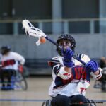 Coaches with Wheelchair Lacrosse USA held a lacrosse clinic to help promote and introduce the sport to a group of local Phoenix, Ariz., athletes. (Photo by Christopher Di Virgilio).