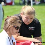 Rachel Kroener consults with her coach during the 2013 NJDC. (Photo by Lucas Stickler).