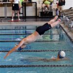 Tagging up during the relay at the 2019 Adaptive Sports USA Junior Nationals in Minn. (Photo by Christopher Di Virgilio).
