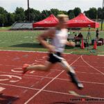 Crossing the finish line at the 2019 Adaptive Sports USA Junior Nationals in Minn. (Photo by Christopher Di Virgilio).