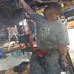 Damon performs some maintenance on his accessible van. Now that's Wheels UP!