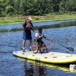 Dalmace gives paddleboarding a go