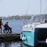 Greg Monteverde getting aboard for an Adaptive Sailing trip.