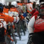 Good sportsmanship is the name of the game at the 2019 Wheelchair Lacrosse USA Tournament in Long Island, NY. (Photo by Christopher Di Virgilio/SNS).