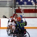 The ball in the air at the 2019 Wheelchair Lacrosse USA Tournament in Long Island, NY. (Photo by Christopher Di Virgilio/SNS).