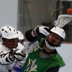 Dr. Kenneth Lee (white shirt) tries to reach for the ball during the 2019 Wheelchair Lacrosse USA Tournament in Long Island, NY. (Photo by Christopher Di Virgilio/SNS).