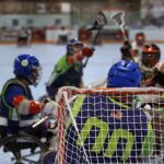 The goalie reacts to the large group of offensive players coming at him during the 2019 Wheelchair Lacrosse USA Tournament in Long Island, NY. (Photo by Christopher Di Virgilio/SNS).