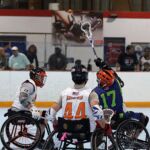 An over-the-shoulder pass at the 2019 Wheelchair Lacrosse USA Tournament in Long Island, NY. (Photo by Christopher Di Virgilio/SNS).