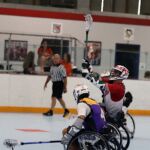 Making the pass at the 2019 Wheelchair Lacrosse USA Tournament in Long Island, NY. (Photo by Christopher Di Virgilio/SNS).