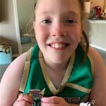 Izabella Uccello is proud of her cheer pin