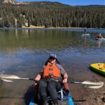 Kathleen gets ready for a day of paddleboarding with friends.