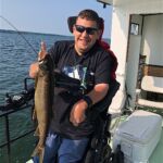 Kevin landed "the biggest fish of the day" at Green Lake in Wisc.