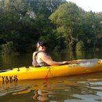 Megan enjoys the water in her kayak