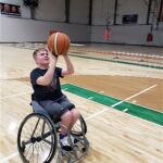 Michael has the court to himself for a little wheelchair basketball practice.