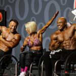 Wheelchair bodybuilders Steve lister (l), Jen Pasky Jaquin (c) and Harold Kelly pose down at the 2019 Mr. Olympia in Las Vegas, Nev. (Photo by Christopher DiVirgilio/SNS).