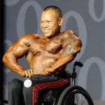 Third-place winner, Kris Dim works his routine on stage at the 2019 Mr. olympia in Las Vegas, Nev. (Photo by Christopher DiVirgilio/SNS).