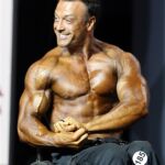 Steve Lister on stage at the 2019 Mr. olympia in Las Vegas, Nev. (Photo by Christopher DiVirgilio/SNS).