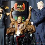 Kris Dim is presented with 3rd-place at the 2019 Mr. Olympia in Las Vegas, Nev. (Photo by Christopher Di Virgilio/SNS).