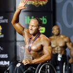 Tyler Berry waves to the fans after being presented with 6th-place at the 2019 Mr. Olympia in Las Vegas, Nev. (Photo by Christopher Di Virgilio/SNS).