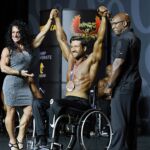 Bradley Betts is presented with 5th-place at the 2019 Mr. Olympia in Las Vegas, Nev. (Photo by Christopher Di Virgilio/SNS).