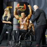 Steve Lister is presented 4th-place at the 2019 Mr. Olympia in Las Vegas, Nev. (Photo by Christopher Di Virgilio/SNS).