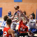 It's a fight for the ball between Dallas and the Junior Blazers at the 2019 West Coast Conference in Mesa, Ariz. (Photo by Christopher DiVirgilio).