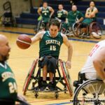 Seattle's Dustin Casey moves the ball during a game against the Kings at the 21st Annual D1 Wheelchair Basketball Tournament in Phoenix, Ariz. (Photo by Christopher Di Virgilio).