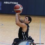 Danny Maravila tries to hit a three-pointer during a game at the 21st Annual D1 Wheelchair Basketball Tournament in Phoenix, Ariz. (Photo by Christopher Di Virgilio).