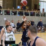 The Punishers and Sonics take the court at the 21st Annual D1 Wheelchair Basketball Tournament in Phoenix, Ariz. (Photo by Christopher Di Virgilio).