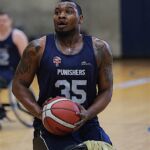 Kevin Atherley, #35, makes a free throw during the 21st Annual D1 Wheelchair Basketball Tournament in Phoenix, Ariz. (Photo by Christopher Di Virgilio).