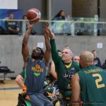 A reach for the ball as the jass and Pacers play during the 21st Annual D1 Wheelchair Basketball Tournament in Phoenix, Ariz. (Photo by Christopher Di Virgilio).