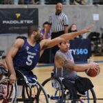 Trey Jenifer, #5, blocks a player during the 21st Annual D1 Wheelchair Basketball Tournament in Phoenix, Ariz. (Photo by Christopher Di Virgilio).