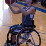 NMCSD Wolfpack's Megan Plunk, #4, attempts a shot during warm-ups at the 21st Annual D1 Wheelchair Basketball Tournament in Phoenix, Ariz. (Photo by: Josh Eisenberg)