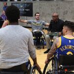 The Warriors huddle during a time out at the 21st Annual D1 Wheelchair Basketball Tournament in Phoenix, Ariz. (Photo by Christopher Di Virgilio).