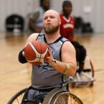 Dallas' Roger Gouge attempts a free throw at the 2020 Toyota national Wheelchair Basketball Tournament in Wichita, Kan. (Photo by Christopher Di Virgilio).