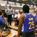 The Road Warriors huddle during a time out at the 2020 Toyota national Wheelchair Basketball Tournament in Wichita, Kan. (Photo by Christopher Di Virgilio).