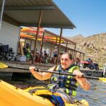 Santanyia Rodabaugh comes on deck after a morning of adaptive kayaking at Bartlett Lake during the 2020 Arizona Adaptive Water Sports Day on the Lake. (Photo by Christopher Di Virgilio). kayaking04