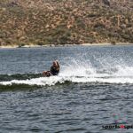 An adaptive water skier gives a wave while at Bartlett Lake in Carefree, Ariz., during the 2020 Arizona Adaptive Watersports Day on the Lake. (Photo by Christopher Di Virgilio). skiing01