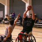 A select group of collegiate wheelchair basketball teams came to Tucson to take part in a collegiate basketball tournament and celebrate celebrating a gift and dedication of the Cody Schechter Gym and Locker Room for Adaptive Athletics from UArizona alumni and Phoenix businessman, Eric Schechter. (Photo by Christopher Di Virgilio).