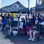 Adaptive participants and supporters celebrate at the Wild West Wake Surf Shootout 2024 April 5-6 at Lake Pleasant in Peoria, Ariz. (Photo by Brittany Martin).