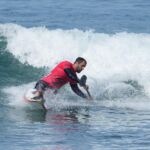 Felipe Kizu-Lima competing in the paddle division during the 2024 Stoke For Life U.S. Open Adaptive Surfing Championships in Oceanside, Calif. (Photo by Rich Jayne/Awaze Media).