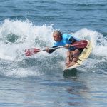 Ethan Kairer competing in the paddle division during the 2024 Stoke For Life U.S. Open Adaptive Surfing Championships in Oceanside, Calif. (Photo by Rich Jayne/Awaze Media).