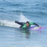 Jose Martinez competing in the prone-assist division during the 2024 Stoke For Life U.S. Open Adaptive Surfing Championships in Oceanside, Calif. (Photo by Rich Jayne/Awaze Media).