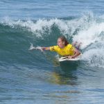 Kai Colless competing in the prone division during the 2024 Stoke For Life U.S. Open Adaptive Surfing Championships in Oceanside, Calif. (Photo by Rich Jayne/Awaze Media).