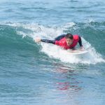 Casey Proud competing in the prone division during the 2024 Stoke For Life U.S. Open Adaptive Surfing Championships in Oceanside, Calif. (Photo by Rich Jayne/Awaze Media).