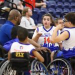 NY Fury's Emelia D'Antonio, No. 14, talks with her teammates during a timeout at the Prep division NWBA Championship win. (Photo by Christopher Di Virgilio).