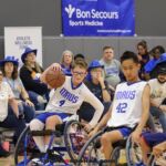 Ethen Hansen, (number 4), moves the ball down court during day one games at the 2025 NWBA National Championships. (Photo by Christopher Di Virgilio).